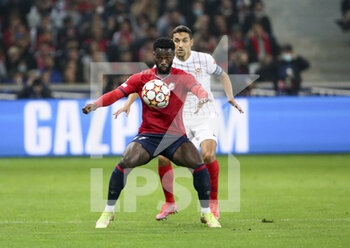 2021-10-20 - Jonathan Bamba of Lille, Jesus Navas of Sevilla FC during the UEFA Champions League, Group G football match between Lille OSC (LOSC) and Sevilla FC on October 20, 2021 at Stade Pierre Mauroy in Villeneuve-d'Ascq near Lille, France - LILLE OSC (LOSC) VS SEVILLA FC - UEFA CHAMPIONS LEAGUE - SOCCER