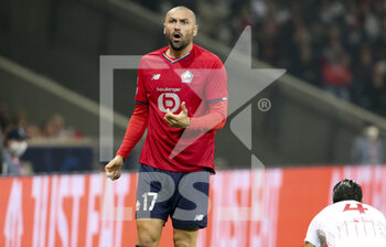 2021-10-20 - Burak Yilmaz of Lille during the UEFA Champions League, Group G football match between Lille OSC (LOSC) and Sevilla FC on October 20, 2021 at Stade Pierre Mauroy in Villeneuve-d'Ascq near Lille, France - LILLE OSC (LOSC) VS SEVILLA FC - UEFA CHAMPIONS LEAGUE - SOCCER