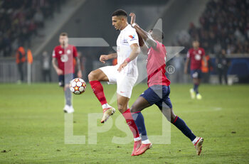 2021-10-20 - Diego Carlos of Sevilla FC during the UEFA Champions League, Group G football match between Lille OSC (LOSC) and Sevilla FC on October 20, 2021 at Stade Pierre Mauroy in Villeneuve-d'Ascq near Lille, France - LILLE OSC (LOSC) VS SEVILLA FC - UEFA CHAMPIONS LEAGUE - SOCCER