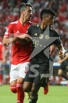 2021-10-20 - Kingsley Coman of Bayern Munich and Andre Almeida of Benfica during the UEFA Champions League, Group E football match between SL Benfica and Bayern Munich on October 20, 2021 at Estadio da Luz in Lisbon, Portugal - SL BENFICA VS BAYERN MUNICH - UEFA CHAMPIONS LEAGUE - SOCCER