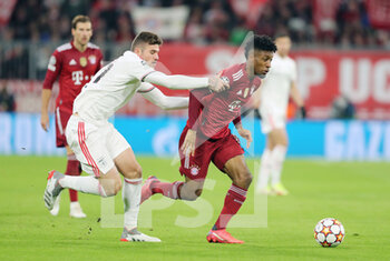 2021-11-02 - Kingsley Coman of Bayern Munich and Morato of Benfica during the UEFA Champions League, Group E football match between Bayern Munich and SL Benfica on November 2, 2021 at Allianz Arena in Munich, Germany - BAYERN MUNICH VS SL BENFICA - UEFA CHAMPIONS LEAGUE - SOCCER