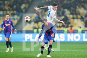 2021-11-02 - Clement Lenglet of FC Barcelona and Denys Garmash of Dinamo Kiev during the UEFA Champions League, Group E football match between Dinamo Kiev and FC Barcelona on November 2, 2021 at the NSC Olimpiyskiy in Kiev, Ukraine - DINAMO KIEV VS FC BARCELONA - UEFA CHAMPIONS LEAGUE - SOCCER