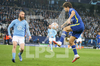 2021-11-02 - Marcos Alonso of FC Chelsea and Jo Inge Berget of Malmo FF during the UEFA Champions League, Group H football match between Malmo FF and Chelsea FC on November 2, 2021 at Eleda Stadion in Malmo, Sweden - MALMO FF VS CHELSEA FC - UEFA CHAMPIONS LEAGUE - SOCCER
