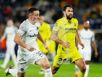 2021-11-02 - Silvan Hefti of Young Boys and Alfonso Pedraza of Villarreal during the UEFA Champions League, Group F football match between Villarreal CF and BSC Young Boys on November 2, 2021 at the Ceramica Stadium in Castellon, Spain - VILLARREAL CF VS BSC YOUNG BOYS - UEFA CHAMPIONS LEAGUE - SOCCER