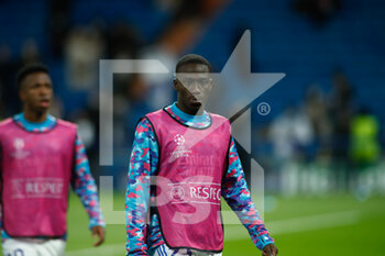 2021-11-03 - Ferland Mendy of Real Madrid warms up during the UEFA Champions League, Group D football match between Real Madrid and Shakhtar Donetsk on November 03, 2021 at Santiago Bernabeu stadium in Madrid, Spain - REAL MADRID VS SHAKHTAR DONETSK - UEFA CHAMPIONS LEAGUE - SOCCER