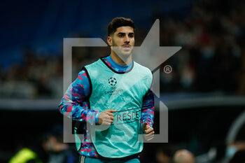 2021-11-03 - Marco Asensio of Real Madrid warms up during the UEFA Champions League, Group D football match between Real Madrid and Shakhtar Donetsk on November 03, 2021 at Santiago Bernabeu stadium in Madrid, Spain - REAL MADRID VS SHAKHTAR DONETSK - UEFA CHAMPIONS LEAGUE - SOCCER