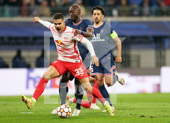 2021-11-03 - Andre Silva of Leipzig and Danilo Pereira of Paris Saint-Germain during the UEFA Champions League, Group A football match between RB Leipzig and Paris Saint-Germain on November 3, 2021 at Red Bull Arena in Leipzig, Germany - RB LEIPZIG VS PARIS SAINT-GERMAIN - UEFA CHAMPIONS LEAGUE - SOCCER