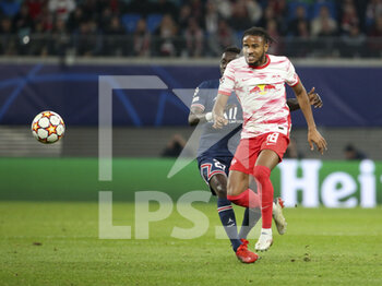 2021-11-03 - Christopher Nkunku of RB Leipzig, Idrissa Gueye Gana of PSG during the UEFA Champions League, Group A football match between RB Leipzig and Paris Saint-Germain (PSG) on November 3, 2021 at Red Bull Arena in Leipzig, Germany - RB LEIPZIG VS PARIS SAINT-GERMAIN - UEFA CHAMPIONS LEAGUE - SOCCER