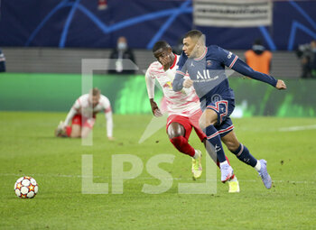 2021-11-03 - Kylian Mbappe of PSG, Nordi Mukiele of RB Leipzig (left) during the UEFA Champions League, Group A football match between RB Leipzig and Paris Saint-Germain (PSG) on November 3, 2021 at Red Bull Arena in Leipzig, Germany - RB LEIPZIG VS PARIS SAINT-GERMAIN - UEFA CHAMPIONS LEAGUE - SOCCER