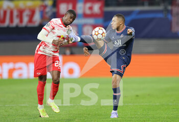 2021-11-03 - Nordi Mukiele of Leipzig and Kylian Mbappe of Paris Saint-Germain during the UEFA Champions League, Group A football match between RB Leipzig and Paris Saint-Germain on November 3, 2021 at Red Bull Arena in Leipzig, Germany - RB LEIPZIG VS PARIS SAINT-GERMAIN - UEFA CHAMPIONS LEAGUE - SOCCER