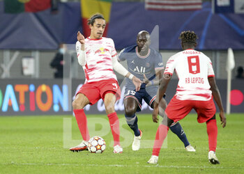 2021-11-03 - Yussuf Poulsen of RB Leipzig, Danilo Pereira of PSG during the UEFA Champions League, Group A football match between RB Leipzig and Paris Saint-Germain (PSG) on November 3, 2021 at Red Bull Arena in Leipzig, Germany - RB LEIPZIG VS PARIS SAINT-GERMAIN - UEFA CHAMPIONS LEAGUE - SOCCER