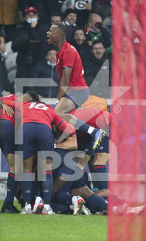 2021-11-23 - Tiago Djalo of Lille and teammates celebrate the goal of Jonathan David during the UEFA Champions League, Group G football match between Lille OSC (LOSC) and RB Salzburg on November 23, 2021 at Pierre Mauroy stadium in Villeneuve-d'Ascq near Lille, France - LILLE LOSC VS FC SALZBURG - UEFA CHAMPIONS LEAGUE - SOCCER