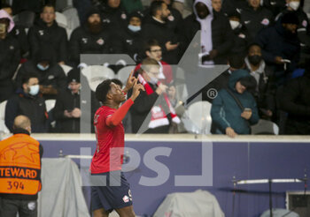 2021-11-23 - Jonathan David of Lille celebrates his goal during the UEFA Champions League, Group G football match between Lille OSC (LOSC) and RB Salzburg on November 23, 2021 at Pierre Mauroy stadium in Villeneuve-d'Ascq near Lille, France - LILLE LOSC VS FC SALZBURG - UEFA CHAMPIONS LEAGUE - SOCCER
