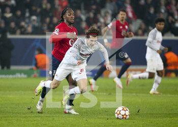 2021-11-23 - Brenden Aaronson of RB Salzburg, Renato Sanches of Lille (left) during the UEFA Champions League, Group G football match between Lille OSC (LOSC) and FC RB Salzburg on November 23, 2021 at Pierre Mauroy stadium in Villeneuve-d'Ascq near Lille, France - LILLE LOSC VS FC SALZBURG - UEFA CHAMPIONS LEAGUE - SOCCER
