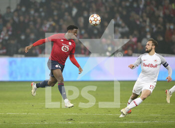 2021-11-23 - Jonathan Bamba of Lille, Andreas Ulmer of RB Salzburg during the UEFA Champions League, Group G football match between Lille OSC (LOSC) and FC RB Salzburg on November 23, 2021 at Pierre Mauroy stadium in Villeneuve-d'Ascq near Lille, France - LILLE LOSC VS FC SALZBURG - UEFA CHAMPIONS LEAGUE - SOCCER
