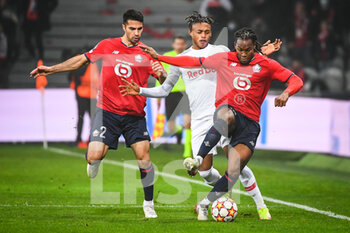 2021-11-23 - Zeki CELIK of Lille, Junior ADAMU of RB Salzbourg and Renato SANCHES of Lille during the UEFA Champions League, Group G football match between Lille LOSC and FC Salzburg on November 23, 2021 at Pierre Mauroy stadium in Villeneuve-d'Ascq near Lille, France - LILLE LOSC VS FC SALZBURG - UEFA CHAMPIONS LEAGUE - SOCCER