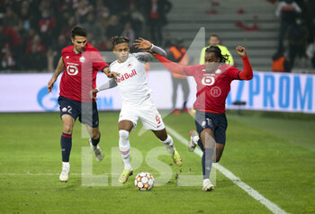2021-11-23 - Mehmet Zeki Celik of Lille, Chikwubuike Adamu of RB Salzburg, Renato Sanches of Lille during the UEFA Champions League, Group G football match between Lille OSC (LOSC) and FC RB Salzburg on November 23, 2021 at Pierre Mauroy stadium in Villeneuve-d'Ascq near Lille, France - LILLE LOSC VS FC SALZBURG - UEFA CHAMPIONS LEAGUE - SOCCER