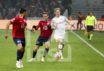 2021-11-23 - Yusuf Yazici of Lille, Maurits KjÊrgaard of RB Salzburg during the UEFA Champions League, Group G football match between Lille OSC (LOSC) and FC RB Salzburg on November 23, 2021 at Pierre Mauroy stadium in Villeneuve-d'Ascq near Lille, France - LILLE LOSC VS FC SALZBURG - UEFA CHAMPIONS LEAGUE - SOCCER