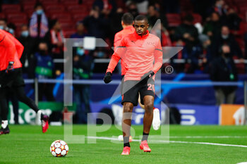 2021-11-24 - Pierre Kalulu of Milan warms up during the UEFA Champions League, Group B football match between Atletico de Madrid and AC Milan on November 24, 2021 at Wanda Metropolitano stadium in Madrid, Spain - ATLETICO DE MADRID VS AC MILAN - UEFA CHAMPIONS LEAGUE - SOCCER