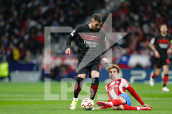 2021-11-24 - Theo Hernandez of Milan and Antoine Griezmann of Atletico de Madrid during the UEFA Champions League, Group B football match between Atletico de Madrid and AC Milan on November 24, 2021 at Wanda Metropolitano stadium in Madrid, Spain - ATLETICO DE MADRID VS AC MILAN - UEFA CHAMPIONS LEAGUE - SOCCER