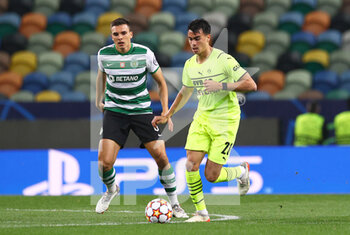 2021-11-24 - Reinier Jesus of Borussia Dortmund and Joao Palhinha of Sporting Lisbon during the UEFA Champions League, Group C football match between Sporting Lisbon and Borussia Dortmund on November 24, 2021 at Jose Alvalade stadium in Lisbon, Portugal - SPORTING LISBON VS BORUSSIA DORTMUND - UEFA CHAMPIONS LEAGUE - SOCCER