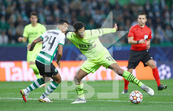 2021-11-24 - Jude Bellingham of Borussia Dortmund and Pedro Porro of Sporting Lisbon during the UEFA Champions League, Group C football match between Sporting Lisbon and Borussia Dortmund on November 24, 2021 at Jose Alvalade stadium in Lisbon, Portugal - SPORTING LISBON VS BORUSSIA DORTMUND - UEFA CHAMPIONS LEAGUE - SOCCER