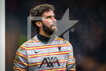 2021-12-07 - Liverpool goalkeeper Alisson Becker warms up during the UEFA Champions League, Group B football match between AC Milan and Liverpool FC on December 7, 2021 at San Siro Stadium in Milan, Italy - AC MILAN VS LIVERPOOL FC - UEFA CHAMPIONS LEAGUE - SOCCER