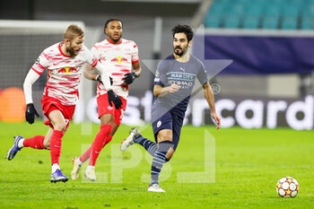 2021-12-07 - Konrad Laimer of Leipzig and Ä°lkay Gundogan (8) of Manchester City during the UEFA Champions League, Group A football match between RB Leipzig and Manchester City on December 7, 2021 at Red Bull Arena in Leipzig, Germany - RB LEIPZIG VS MANCHESTER CITY - UEFA CHAMPIONS LEAGUE - SOCCER