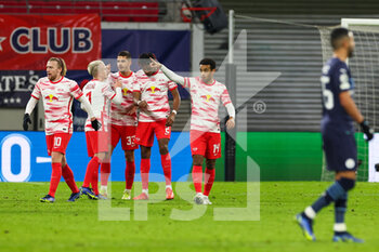 2021-12-07 - Andre Silva (33) of RB Leipzig celebrates after his goal 2-0 during the UEFA Champions League, Group A football match between RB Leipzig and Manchester City on December 7, 2021 at Red Bull Arena in Leipzig, Germany - RB LEIPZIG VS MANCHESTER CITY - UEFA CHAMPIONS LEAGUE - SOCCER