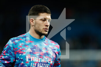 2021-12-07 - Luka Jovic of Real Madrid warms up during the UEFA Champions League, Group D football match between Real Madrid and FC Internazionale on December 7, 2021 at Santiago Bernabeu stadium in Madrid, Spain - REAL MADRID VS FC INTERNAZIONALE - UEFA CHAMPIONS LEAGUE - SOCCER