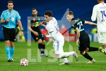 2021-12-07 - Luka Jovic of Real Madrid and Nicolo Barella of Inter during the UEFA Champions League, Group D football match between Real Madrid and FC Internazionale on December 7, 2021 at Santiago Bernabeu stadium in Madrid, Spain - REAL MADRID VS FC INTERNAZIONALE - UEFA CHAMPIONS LEAGUE - SOCCER