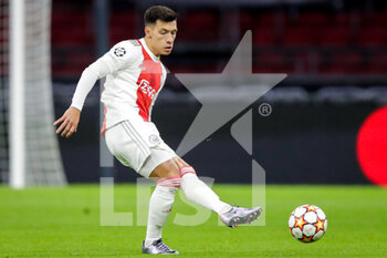 2021-12-07 - Lisandro Martinez of Ajax during the UEFA Champions League, Group C football match between Ajax and Sporting Clube de Portugal on December 7, 2021 at Johan Cruijff ArenA in Amsterdam, Netherlands - AJAX VS SPORTING CLUBE DE PORTUGAL - UEFA CHAMPIONS LEAGUE - SOCCER