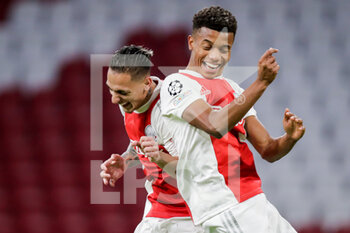 2021-12-07 - David Neres of Ajax celebrates after scoring his sides third goal with Antony during the UEFA Champions League, Group C football match between Ajax and Sporting Clube de Portugal on December 7, 2021 at Johan Cruijff ArenA in Amsterdam, Netherlands - AJAX VS SPORTING CLUBE DE PORTUGAL - UEFA CHAMPIONS LEAGUE - SOCCER