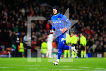 2021-12-08 - MANCHESTER, ENGLAND - DECEMBER 08: goalkeeper Guillaume Faivre of Young Boys runs in the field during the UEFA Champions League group F match between Manchester United and BSC Young Boys at Old Trafford on December 8, 2021 in Manchester, United Kingdom. - MANCHESTER UNITED VS BSC YOUNG BOYS - UEFA CHAMPIONS LEAGUE - SOCCER