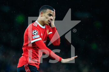 2021-12-08 - MANCHESTER, ENGLAND - DECEMBER 08: Mason Greenwood of Manchester United celebrates his goal during the UEFA Champions League group F match between Manchester United and BSC Young Boys at Old Trafford on December 8, 2021 in Manchester, United Kingdom. - MANCHESTER UNITED VS BSC YOUNG BOYS - UEFA CHAMPIONS LEAGUE - SOCCER