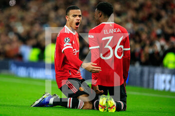 2021-12-08 - MANCHESTER, ENGLAND - DECEMBER 08: Mason Greenwood of Manchester United (L) celebrating his goal with Anthony Elanga of Manchester United (R) during the UEFA Champions League group F match between Manchester United and BSC Young Boys at Old Trafford on December 8, 2021 in Manchester, United Kingdom. - MANCHESTER UNITED VS BSC YOUNG BOYS - UEFA CHAMPIONS LEAGUE - SOCCER