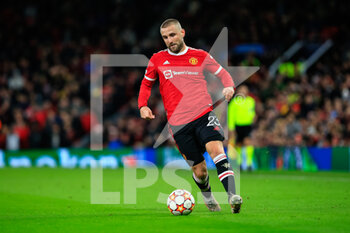 2021-12-08 - MANCHESTER, ENGLAND - DECEMBER 08: Luke Shaw of Manchester United in action during the UEFA Champions League group F match between Manchester United and BSC Young Boys at Old Trafford on December 8, 2021 in Manchester, United Kingdom. - MANCHESTER UNITED VS BSC YOUNG BOYS - UEFA CHAMPIONS LEAGUE - SOCCER