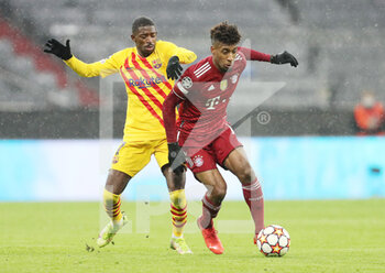 2021-12-08 - Kingsley Coman of Bayern Munich and Ousmane Dembele of FC Barcelona during the UEFA Champions League, Group E football match between Bayern Munich and FC Barcelona on December 8, 2021 at Allianz Arena in Munich, Germany - BAYERN MUNICH VS FC BARCELONA - UEFA CHAMPIONS LEAGUE - SOCCER