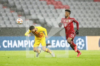 2021-12-08 - Clement Lenglet of FC Barcelona and Kingsley Coman of Bayern Munich during the UEFA Champions League, Group E football match between Bayern Munich and FC Barcelona on December 8, 2021 at Allianz Arena in Munich, Germany - BAYERN MUNICH VS FC BARCELONA - UEFA CHAMPIONS LEAGUE - SOCCER