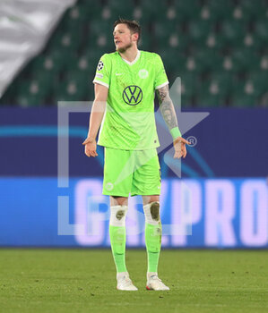 2021-12-08 - Wout Weghorst of Wolfsburg reacts during the UEFA Champions League, Group G football match between VfL Wolfsburg and LOSC Lille on December 8, 2021 at Volkswagen Arena in Wolfsburg, Germany - VFL WOLFSBURG VS LOSC LILLE - UEFA CHAMPIONS LEAGUE - SOCCER