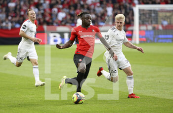 2021-08-19 - Jeremy Doku of Rennes, Edvard Tagseth of Rosenborg during the UEFA Europa Conference League, Play-offs, 1st leg between Stade Rennais and Rosenborg BK on August, 19, 2021 at Roazhon Park in Rennes, France - Photo Jean Catuffe / DPPI - STADE RENNAIS VS ROSENBORG BK - UEFA CONFERENCE LEAGUE - SOCCER