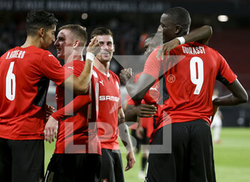 2021-08-19 - Serhou Guirassy of Rennes (right) celebrates his goal with teammates during the UEFA Europa Conference League, Play-offs, 1st leg between Stade Rennais and Rosenborg BK on August, 19, 2021 at Roazhon Park in Rennes, France - Photo Jean Catuffe / DPPI - STADE RENNAIS VS ROSENBORG BK - UEFA CONFERENCE LEAGUE - SOCCER