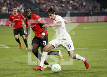 2021-09-16 - Bryan Gil of Tottenham, Chimuanya Ugochukwu of Rennes during the UEFA Europa Conference League, Group Stage, Group G football match between Stade Rennais and Tottenham Hotspur on September 16, 2021 at Roazhon Park stadium in Rennes, France - STADE RENNAIS VS TOTTENHAM HOTSPUR - UEFA CONFERENCE LEAGUE - SOCCER