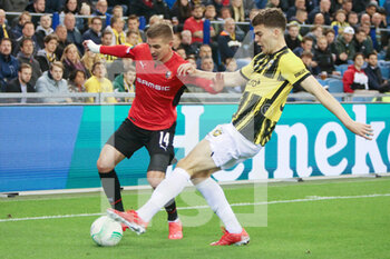2021-09-30 - Benjamin Bourigeaud of Stade Rennais and Jacob Rasmussen of Vitesse during the UEFA Europa Conference League, Group G football match between Vitesse Arnhem and Stade Rennais (Rennes) on September 30, 2021 at GelreDome in Arnhem, Netherlands - VITESSE ARNHEM VS STADE RENNAIS (RENNES) - UEFA CONFERENCE LEAGUE - SOCCER