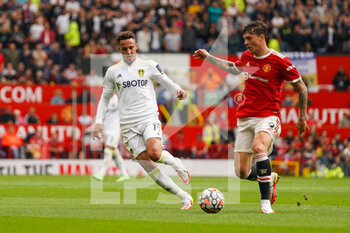 2021-08-14 - Leeds United forward Rodrigo Moreno (19) and Manchester United defender Victor Lindelof (2) during the English championship Premier League football match between Manchester United and Leeds United on August 14, 2021 at Old Trafford in Manchester, England - Photo Malcolm Bryce / ProSportsImages / DPPI - MANCHESTER UNITED VS LEEDS UNITED - ENGLISH PREMIER LEAGUE - SOCCER
