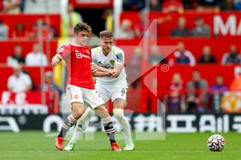 2021-08-14 - Daniel James of Manchester United and Leeds United defender Liam Cooper during the English championship Premier League football match between Manchester United and Leeds United on August 14, 2021 at Old Trafford in Manchester, England - Photo Simon Davies / ProSportsImages / DPPI - MANCHESTER UNITED VS LEEDS UNITED - ENGLISH PREMIER LEAGUE - SOCCER