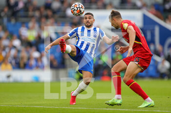 2021-08-21 - Neal Maupay (9) of Brighton & Hove Albion beats Craig Cathcart (15) of Watford to the ball during the English championship Premier League football match between Brighton and Hove Albion and Watford on August 21, 2021 at the American Express Community Stadium in Brighton and Hove, England - Photo Nigel Keene / ProSportsImages / DPPI - BRIGHTON AND HOVE ALBION VS WATFORD - ENGLISH PREMIER LEAGUE - SOCCER