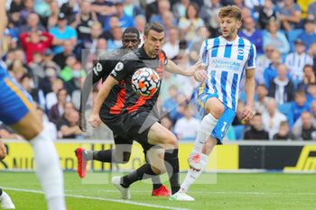 2021-08-28 - Everton defender Seamus Coleman (23) battles with Brighton and Hove Albion midfielder Adam Lallana (14) during the English championship Premier League football match between Brighton and Hove Albion and Everton on August 28, 2021 at the American Express Community Stadium in Brighton and Hove, England - Photo Phil Duncan / ProSportsImages / DPPI - BRIGHTON AND HOVE ALBION VS EVERTON - ENGLISH PREMIER LEAGUE - SOCCER