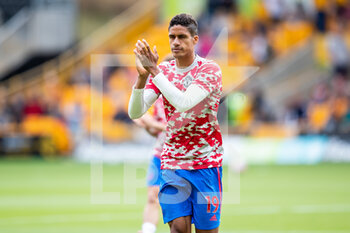 2021-08-29 - Manchester Utd defender Raphael Varane (19) on debut acknowledges crowd before the English championship Premier League football match between Wolverhampton Wanderers and Manchester United on August 29, 2021 at Molineux in Wolverhampton, England - Photo Manjit Narotra / ProSportsImages / DPPI - WOLVERHAMPTON WANDERERS VS MANCHESTER UNITED - ENGLISH PREMIER LEAGUE - SOCCER