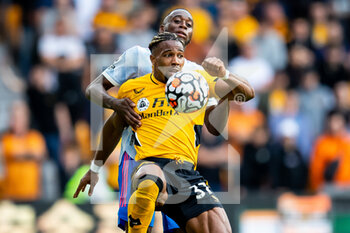2021-08-29 - Adama Traore of Wolverhampton Wanderers holds off Manchester Utd defender Aaron Wan-Bissaka during the English championship Premier League football match between Wolverhampton Wanderers and Manchester United on August 29, 2021 at Molineux in Wolverhampton, England - Photo Manjit Narotra / ProSportsImages / DPPI - WOLVERHAMPTON WANDERERS VS MANCHESTER UNITED - ENGLISH PREMIER LEAGUE - SOCCER